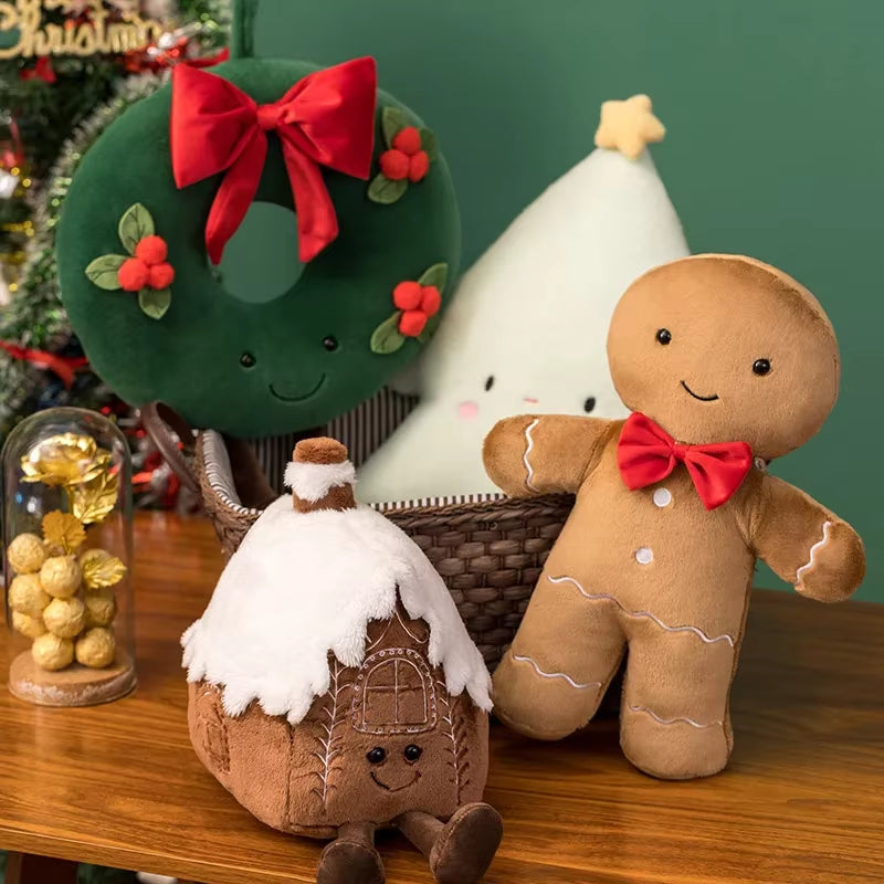 Collection coussins Noël peluche cosy décorations sapin bonhomme pain d’épices