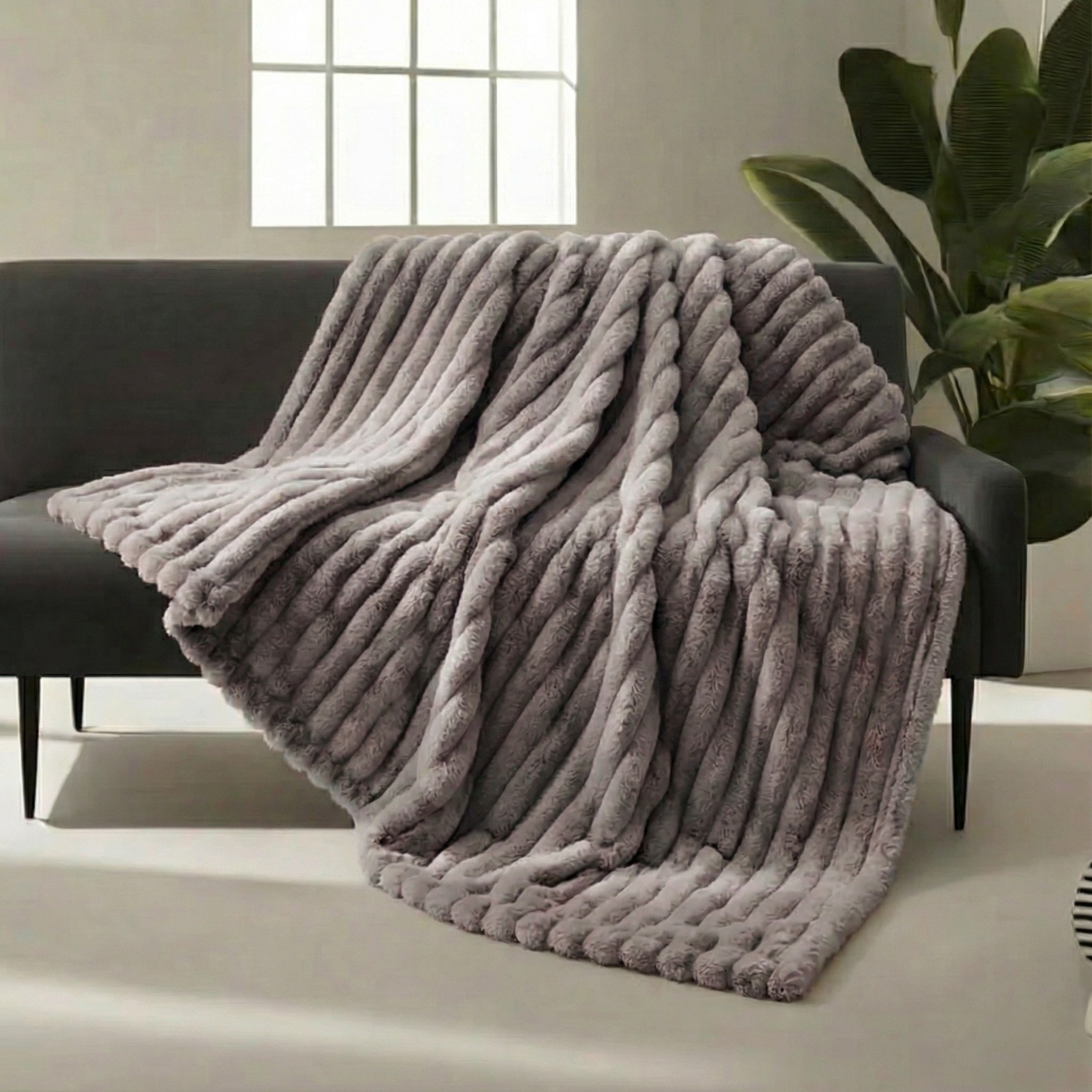 Couverture plaid fausse fourrure ultra douce gris cosy pour canapé hiver 2026