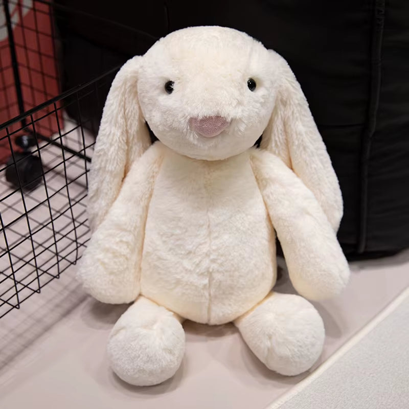 Peluche lapin kawaii longues oreilles blanc assis doudou ultra doux