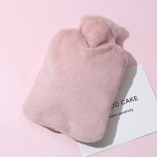 Bouillotte peluche rose chauffe pieds ventre chaude hiver confort
