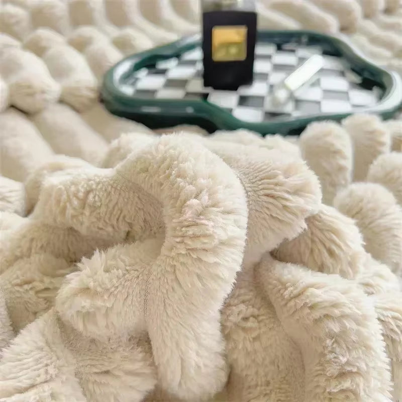 Couverture plaid fausse fourrure ultra douce texture moelleuse cosy hiver 2026